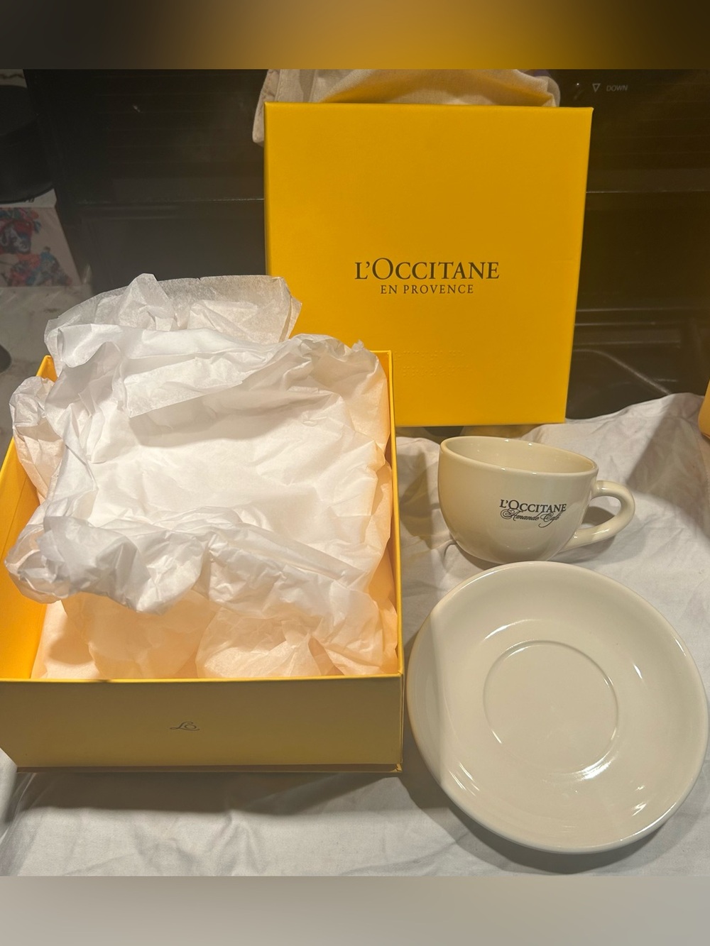 L'OCCITANE Cream Ceramic Cup and Saucer with Yellow Branded Box